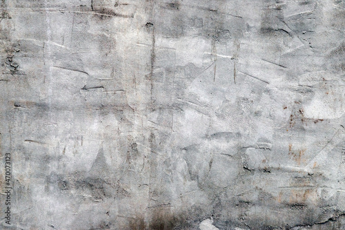 Poor quality of work on leveling concrete walls. Concrete wall with traces of alignment background. 