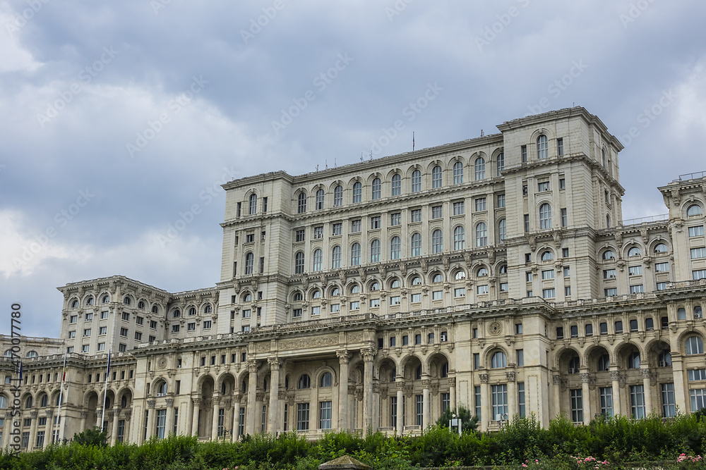 Palace of the Parliament (Palatul Parlamentului) building in Socialist realist Neoclassical architectural forms. Palace reaches a height of 84 meters. Bucharest, capital city of Romania.
