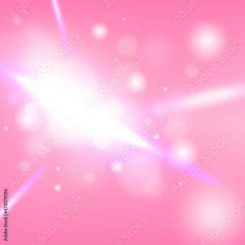 Pink bokeh background shining with dreamy colors of ray of light