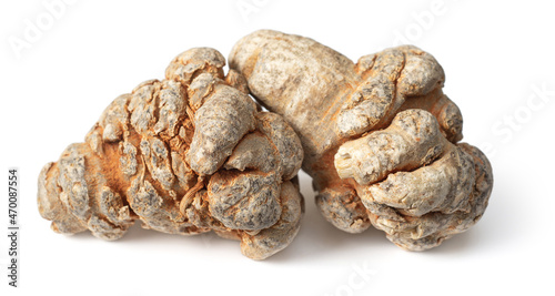 Dried herb, notoginseng roots isolated on white background photo