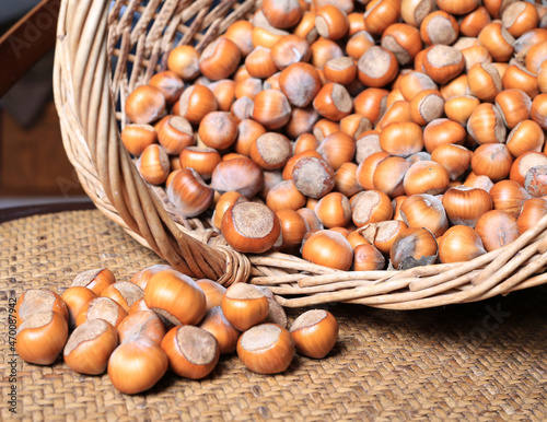 Hazelnuts in a wicker basket close-up
