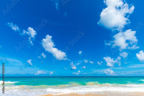 Beautiful white sand sea beach wave colorful sky with cloud © themorningglory