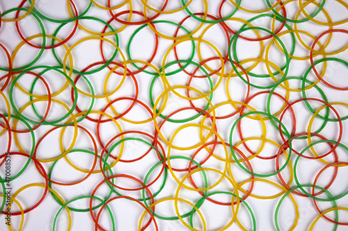Multicolor rubber bands on a white background