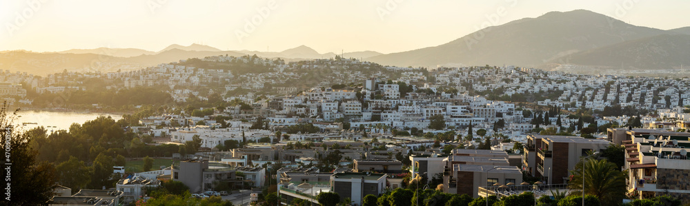 A magnificent landscape with a view of the city of Gumbet in the setting sun.
