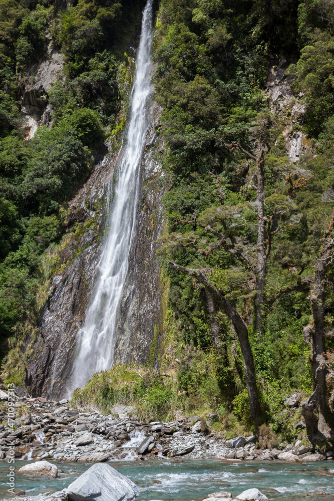 Scenic view of Thunder Creek Falls in New Zealand