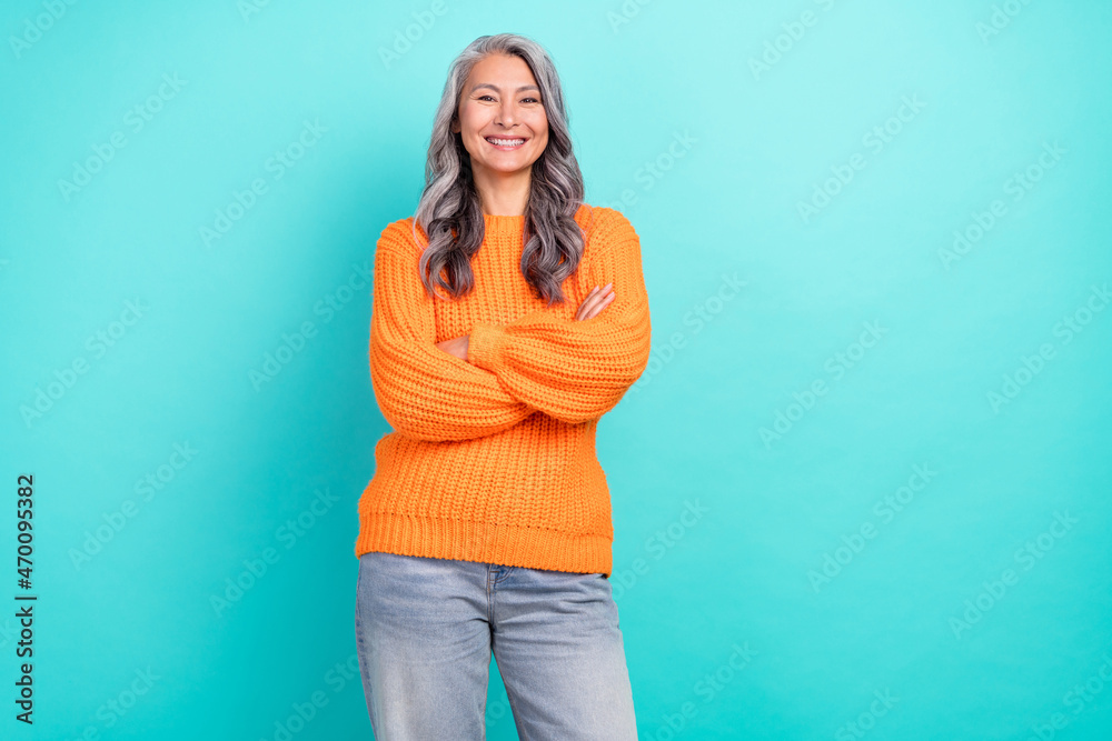 Portrait of attractive cheerful grey-haired woman folded arms laughing funny  joke isolated over vivid teal turquoise color background Stock Photo |  Adobe Stock