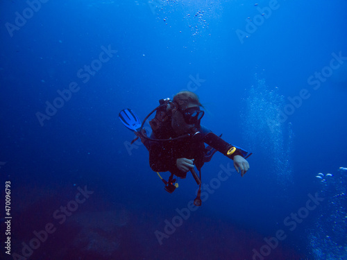 Scuba diver in clear blue water. Diving in clear water. Sardinia Italy © LP Productions