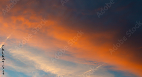 Colorful sunset background with dark and light parts in sky © smaliariryna