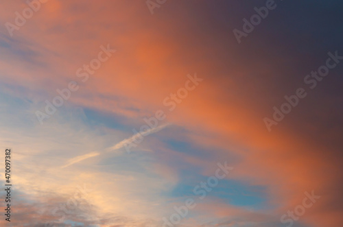 Colorful sunset background with dark and light parts in sky © smaliariryna