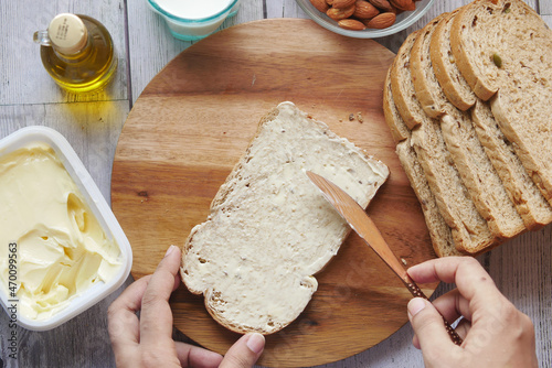 soft butter spread and breads on table  photo