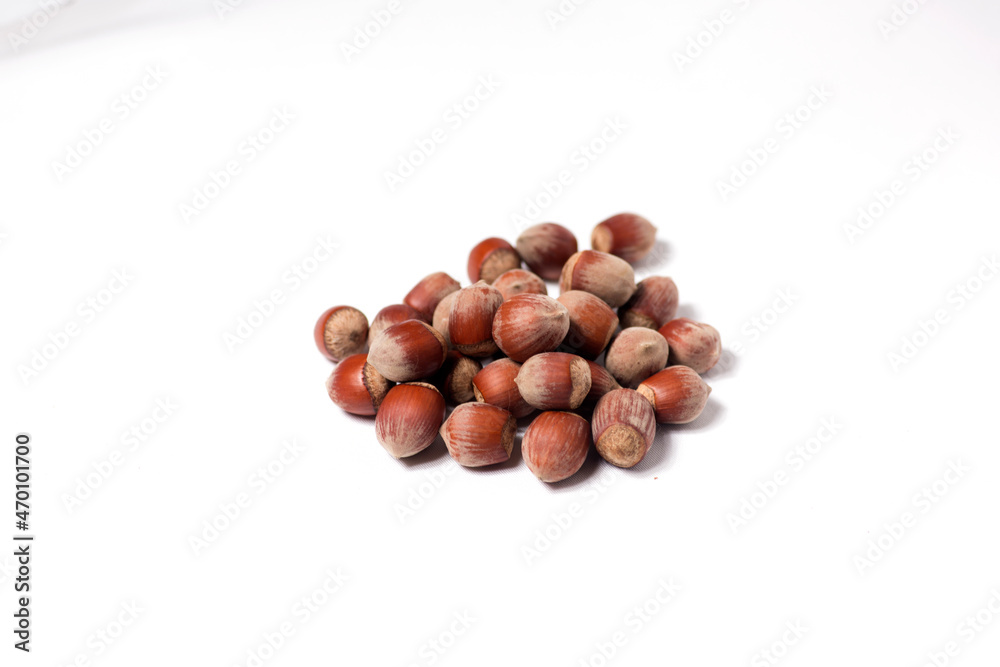 a pile of hazelnut isolated on white background flat lay a pile of hazelnut isolated on white background flat lay