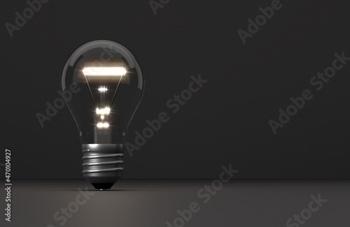 Fototapeta Naklejka Na Ścianę i Meble -  old glowing light bulb in front of background - 3D Illustration
