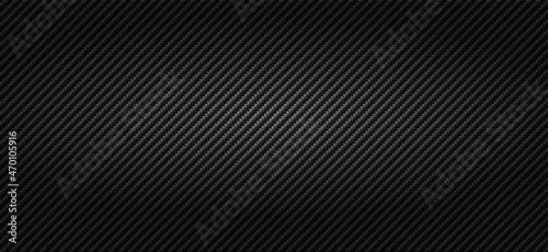 Nice dark carbon fibre background pattern design. Subtle gray lines of strong light weight woven fabric. Bulletproof material