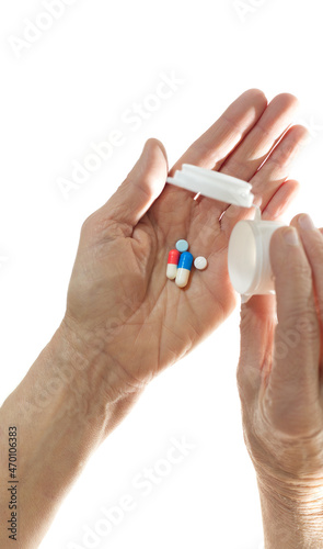 Group of pills in palm of hand. Taking the medicines concept