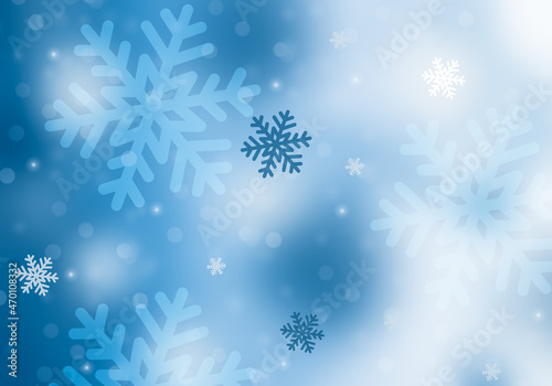 Winter blue background with snowflakes. © Irina