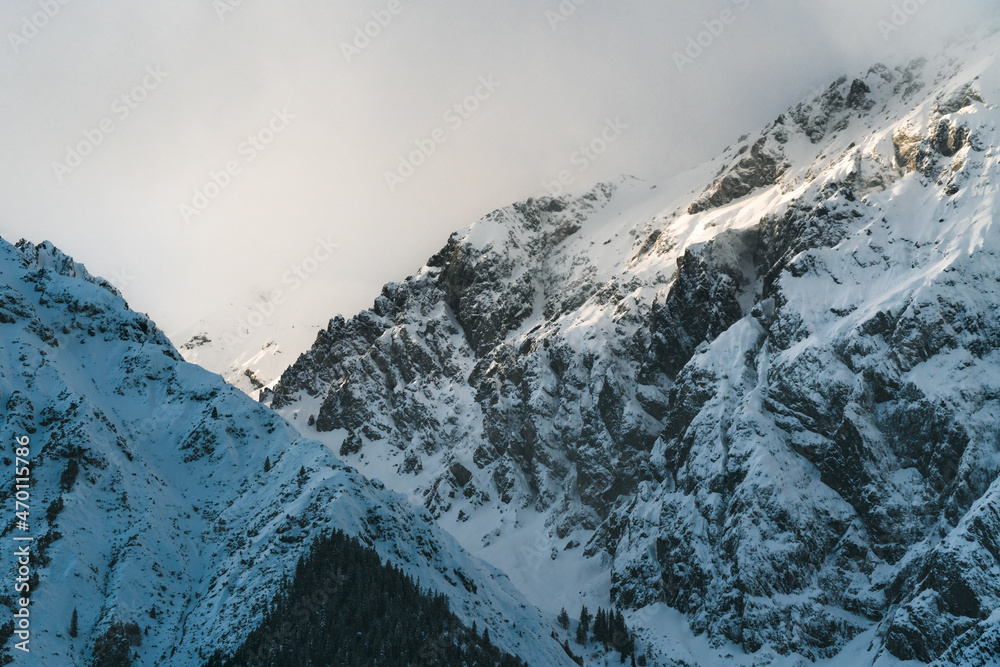 Snowcapped alpine mountains with cloudy peaks at 'Mieminger Kette', Tirol, Austria Snowcapped alpine mountains with cloudy peaks at 'Mieminger Kette', Tirol, Austria