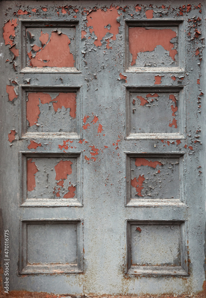 Old gray wooden door close-up. Old gray wooden door close-up.