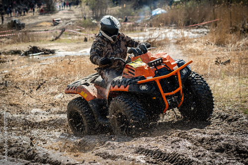 ATV rider in hard dirt track. Extreme ride.