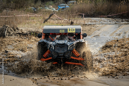 ATV and UTV in action in water hard road. Extreme offroad ride. 4x4.