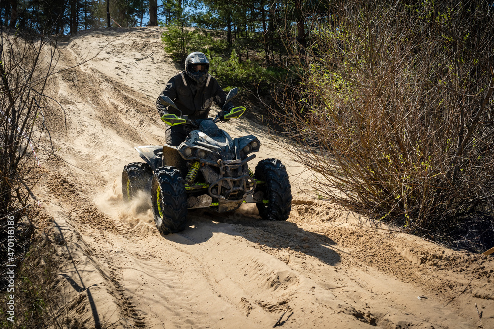 ATV and UTV racing in sand track. Amateur competitions. 4x4 ATV and UTV racing in sand track. Amateur competitions. 4x4