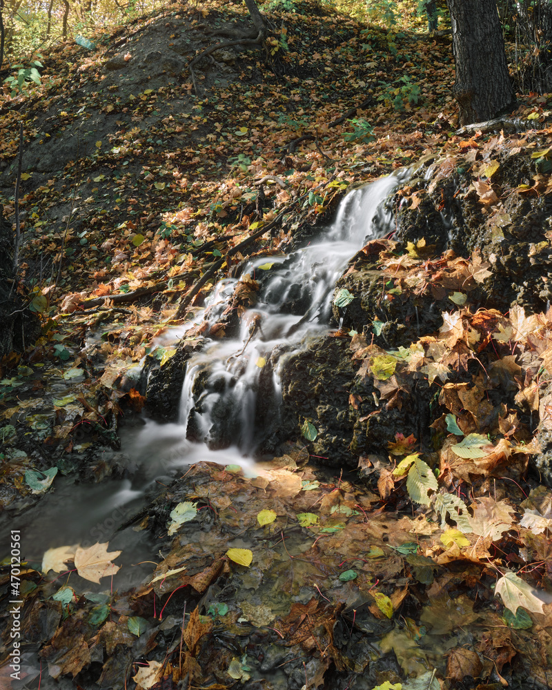 panorama of the waterfall in the autumn forest panorama of the waterfall in the autumn forest