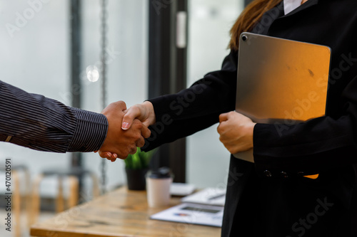 Businessman handshake for the teamwork of business merger and acquisition, successful negotiate, handshake, two business shake hand with a partner to celebration partnership and business deal concept photo