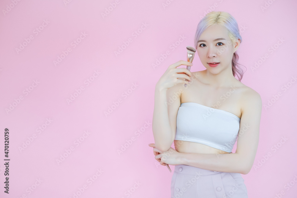 posing beautiful asia woman posing on pink background, emotions action, beauty concept posing beautiful asia woman posing on pink background, emotions action, beauty concept