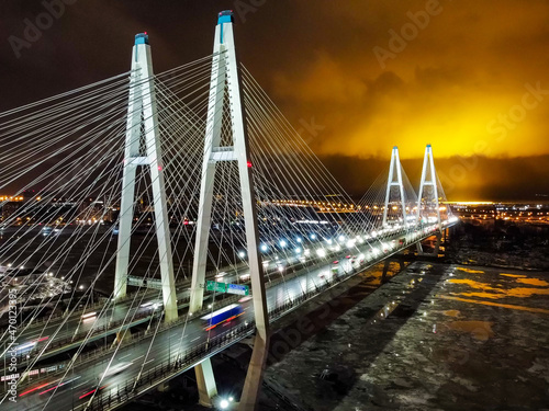 Cable-stayed evening bridge with lighting. Russia, Saint Petersburg