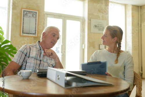 Obraz na plátně woman interviewing a middle-aged man