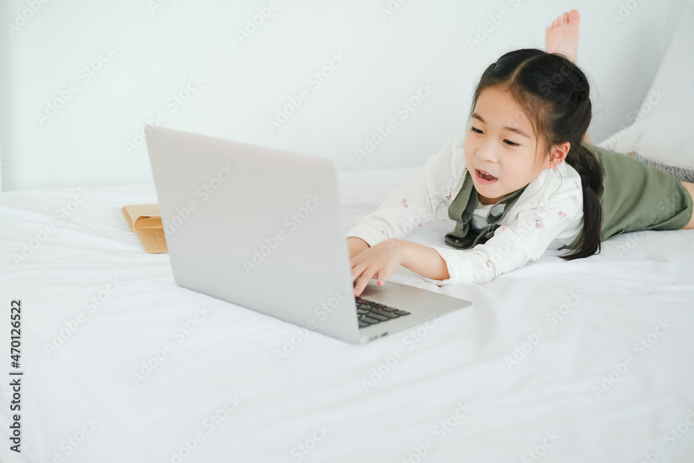 Asia little cut girl learning online at home Asia little cut girl learning online at home