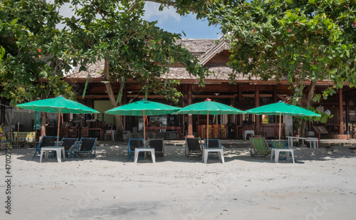 Chairs And Umbrella In Palm Beach for relaxing activity on the beach.