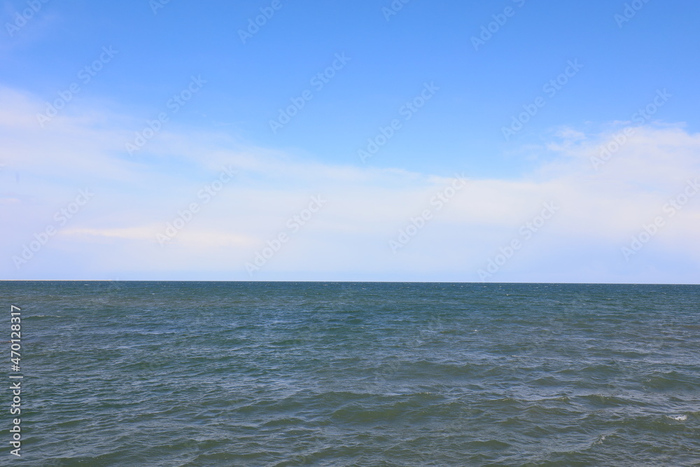 Ocean under blue sky and white clouds, North China