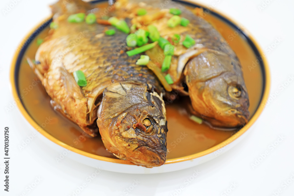 Chinese traditional dish - Home stewed crucian carp Chinese traditional dish - Home stewed crucian carp