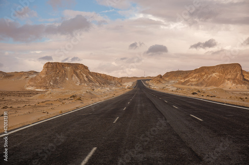 Three-lane road with beautiful sky in the desert of Egypt