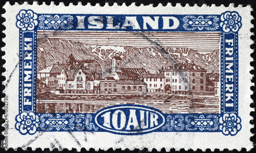 Ancient icelandic postage stamp with a village