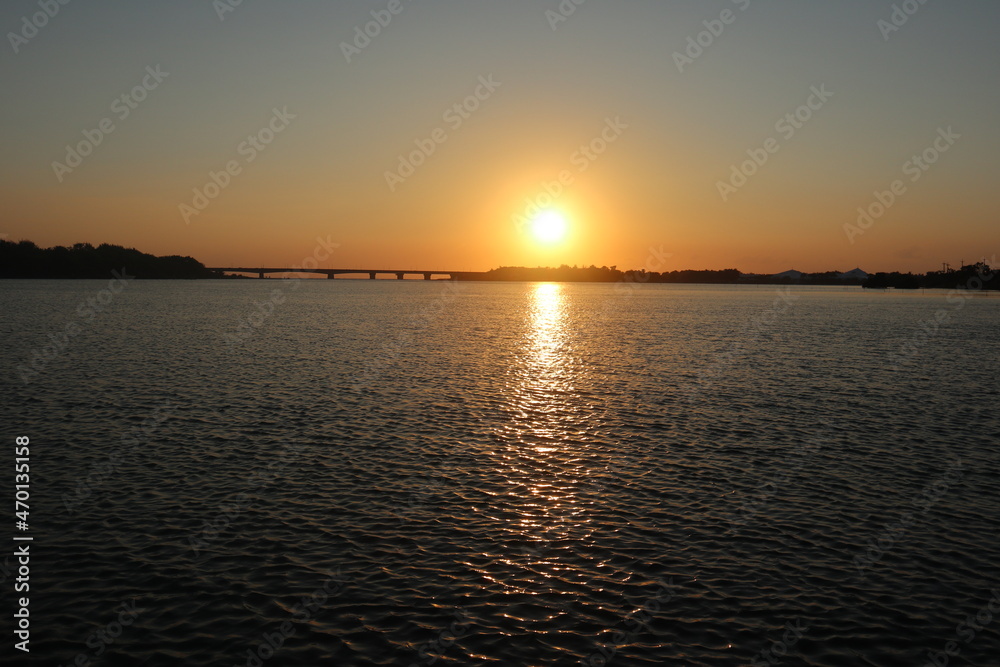 sunset in tainan taiwan between river and ocean design for holiday and retirement concept
