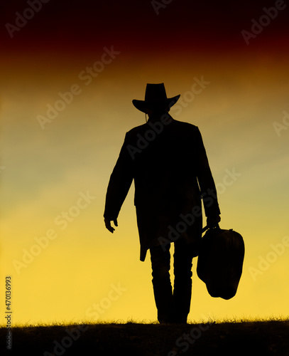 Lonesome Cowboy going back home at Golden Hour