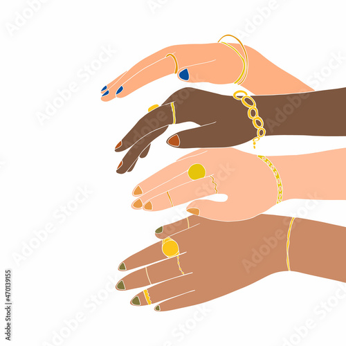 Multiracial women hands with gold jewelry. Bracelets and rings on female hands. Gold Jewelry and luxury accessories on white background close up. High Fashion art concept