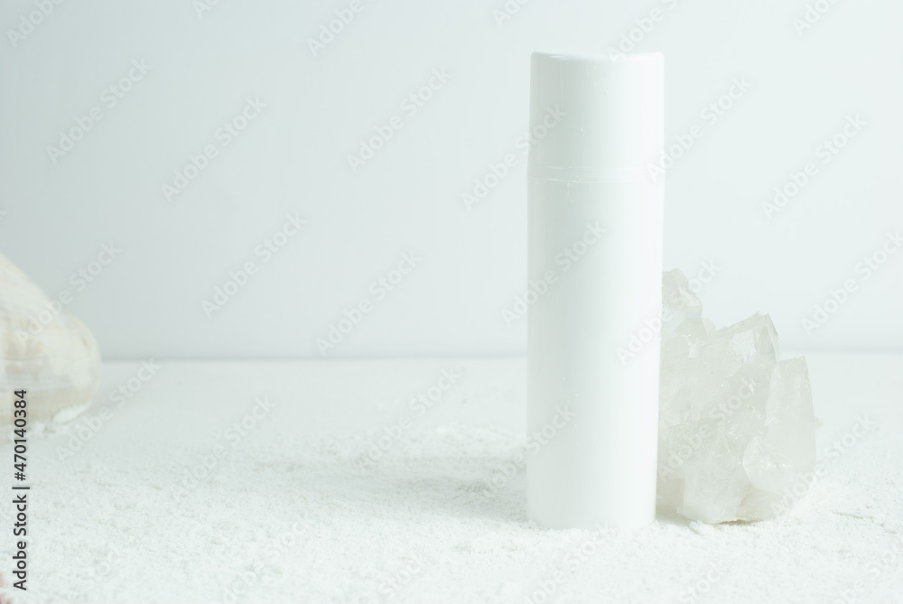Bottle of cream on a white background with crystal Bottle of cream on a white background with crystal