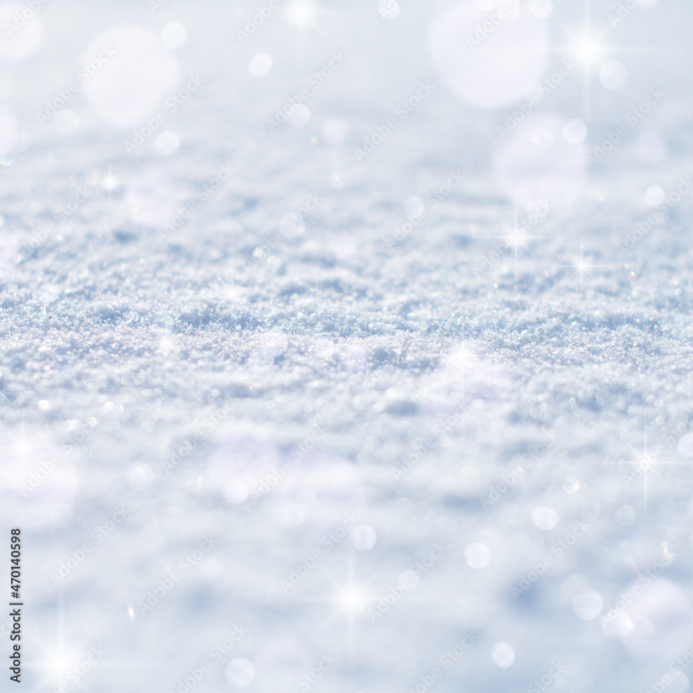 Macro texture of the snow surface with bokeh highlights, fabulous lighting effect and with a place for the inscription Macro texture of the snow surface with bokeh highlights, fabulous lighting effect and with a place for the inscription