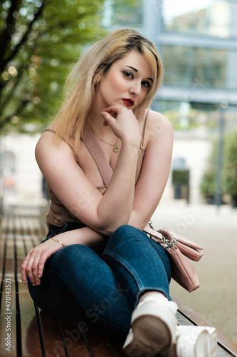 Blonde young pale woman posing and looking to camera. © Jorge Elizaquibel