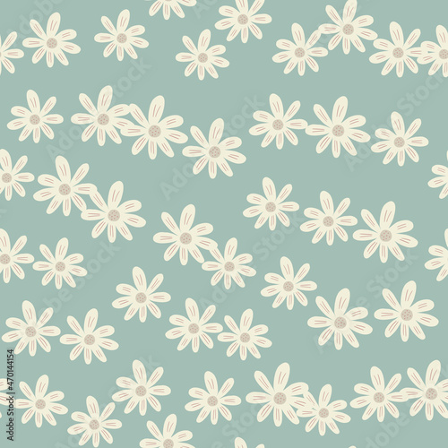 Abstract ditsy flowers seamless pattern on green background. Floral ornament.