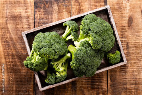 Fresch Broccoli slices on plate. photo