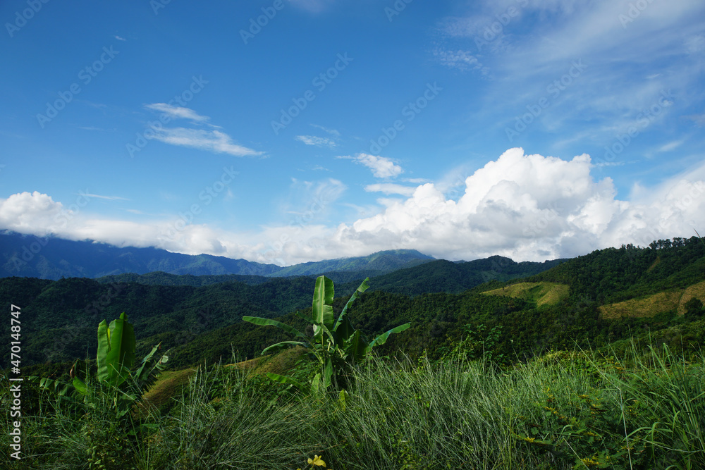 Obraz premium Wonderful landscape of mountains with blue sky in Doi Phu Kha National Park, Nan Province, Thailand.