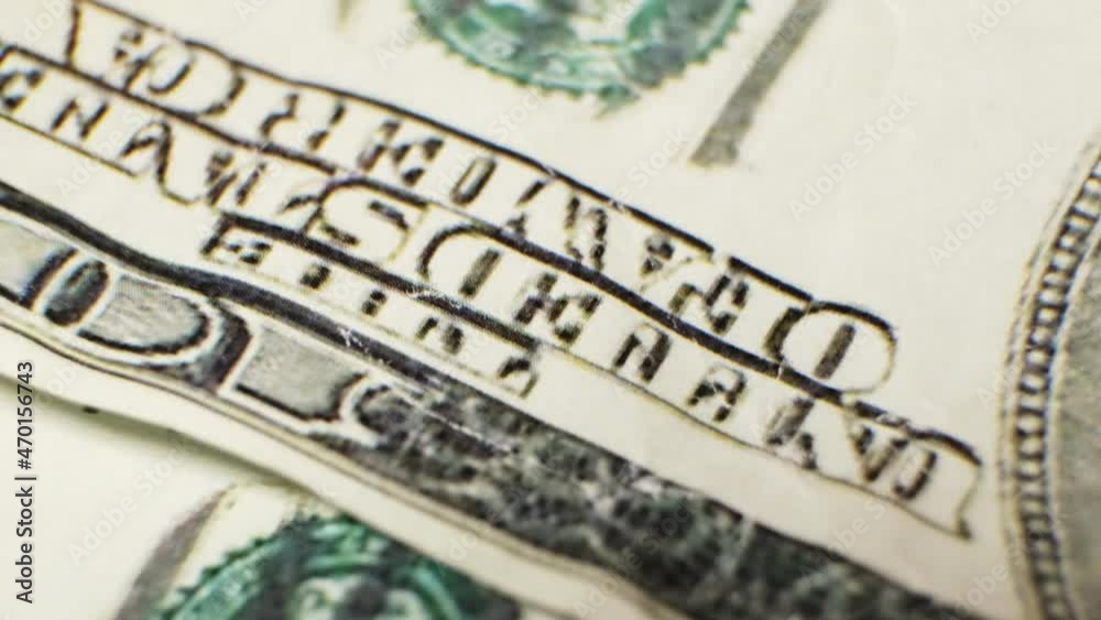 Fake one hundred dollar bills move on the table close-up. Fake one hundred dollar bills move on the table close-up.
