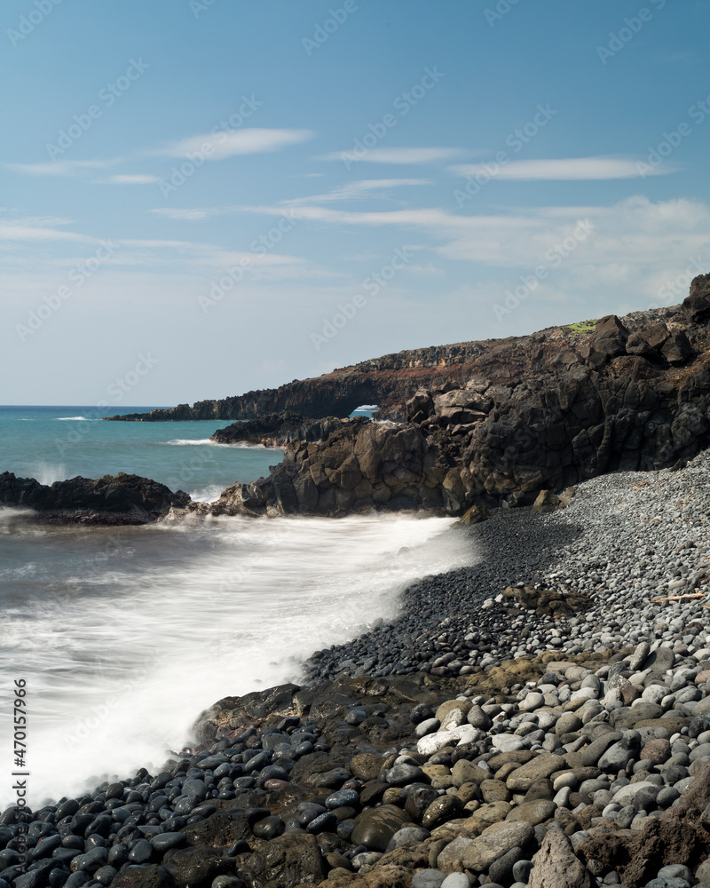 a lone river rock-strewn shoreline along Maui's Southeastern coastline. a lone river rock-strewn shoreline along Maui's Southeastern coastline.