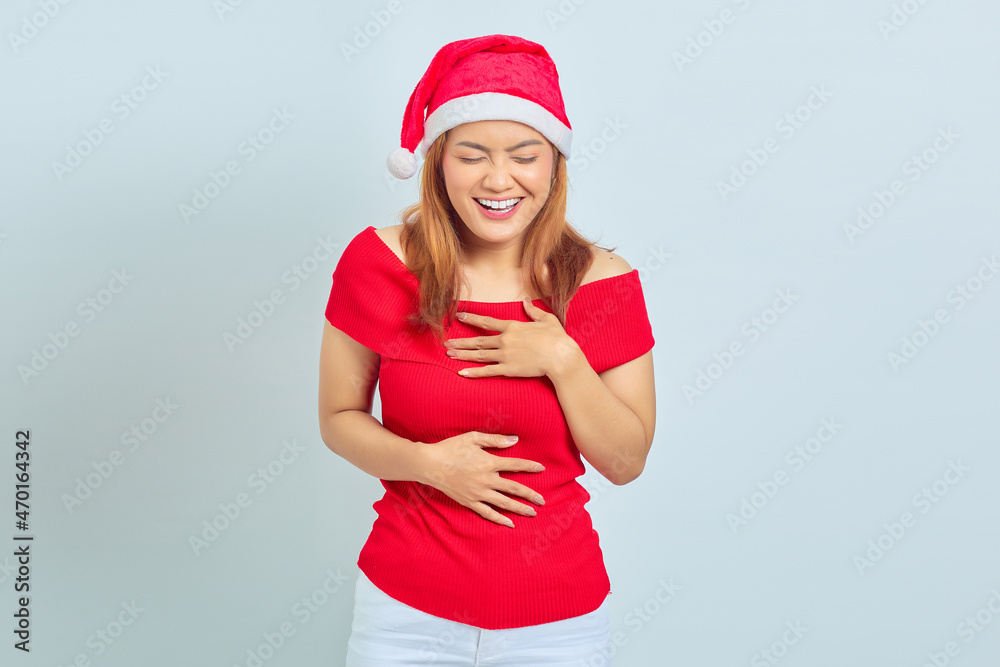 Attractive young Asian woman with laughing face on white background Attractive young Asian woman with laughing face on white background