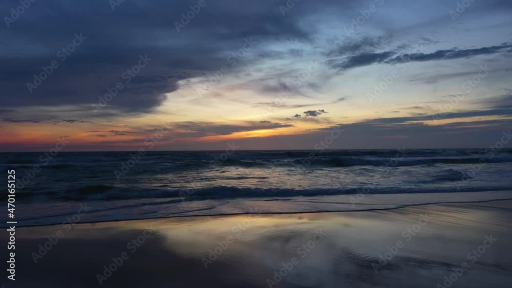 aerial view wave after wave swept towards the shore. .Landscapes view of beach sea sand and wave in sunset. .Beach sea space area. Blue sea, waves crashing at Karon Beach, Phuket Thailand. aerial view wave after wave swept towards the shore. .Landscapes view of beach sea sand and wave in sunset. .Beach sea space area. Blue sea, waves crashing at Karon Beach, Phuket Thailand.