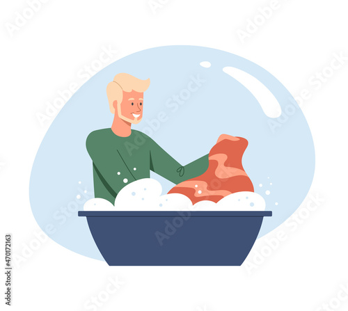Clothing care concept. Young smiling man washes dirty clothes with his own hands using detergent. Bearded male character in bathroom cleans his shirt in foam. Cartoon flat vector illustration