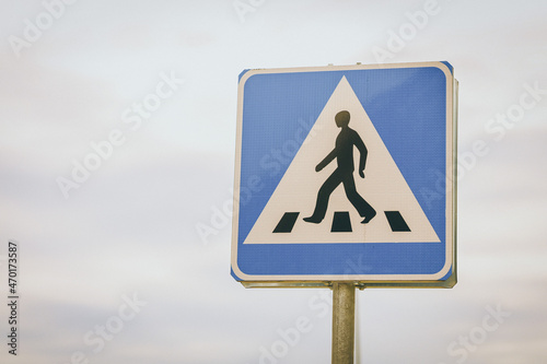 crossing sign on the road
